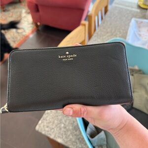 kate spade black leather zip-around wallet with gold logo